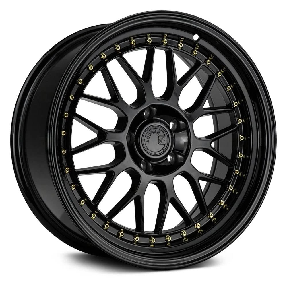 Gloss Black Wheel with Gold Rivets L94059